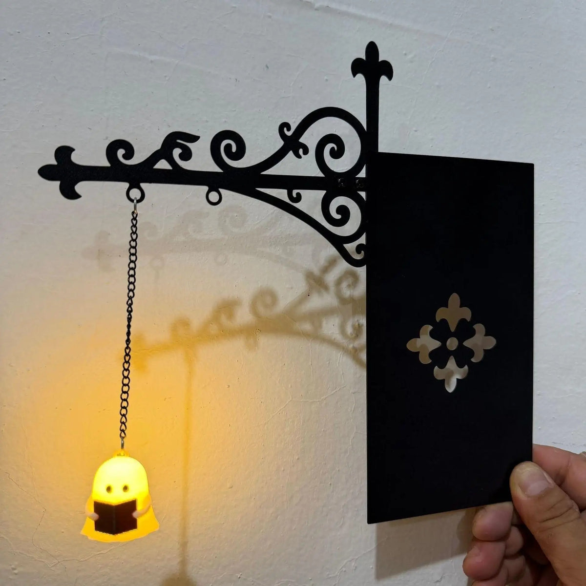 Ghostly Swinging Bookshelf Lantern